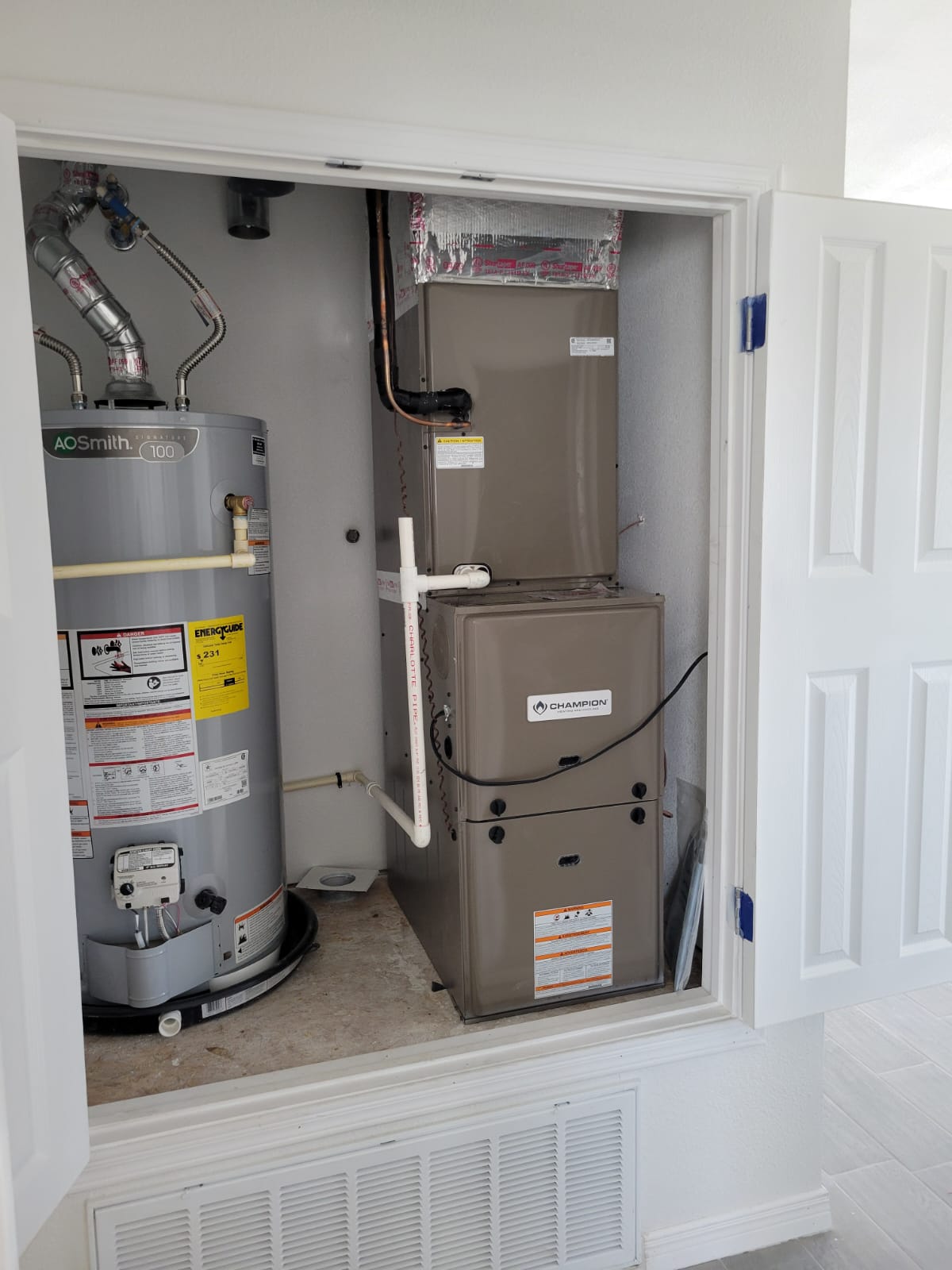 HVAC air handler installed in a utility closet