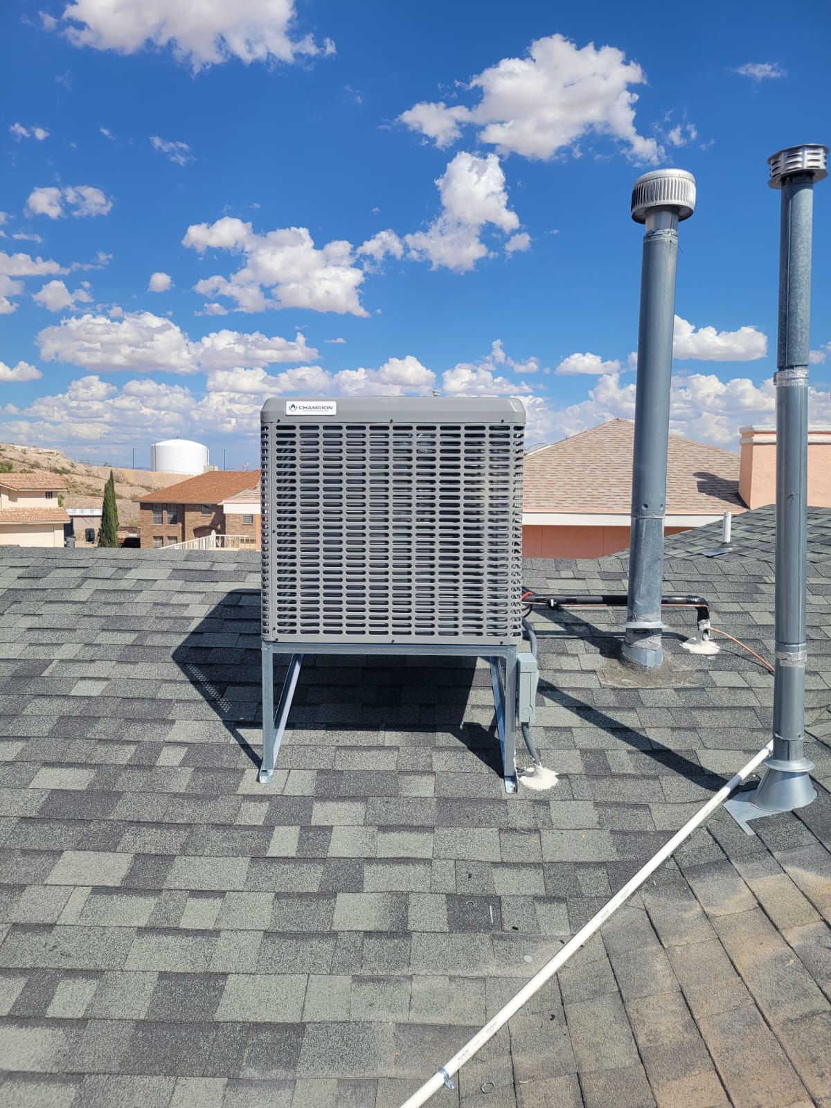 Rooftop condenser unit installed on a commercial roof